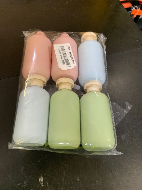 Photo 1 of YXQ 6.8oz Refillable Squeeze Bottles,Plastic Travel Bottles with Flip Cap 200ml Empty Containers for Toiletries Lotion Cream Shampoo Leak Proof Travel Bottle 3 Color?6Pcs Total
