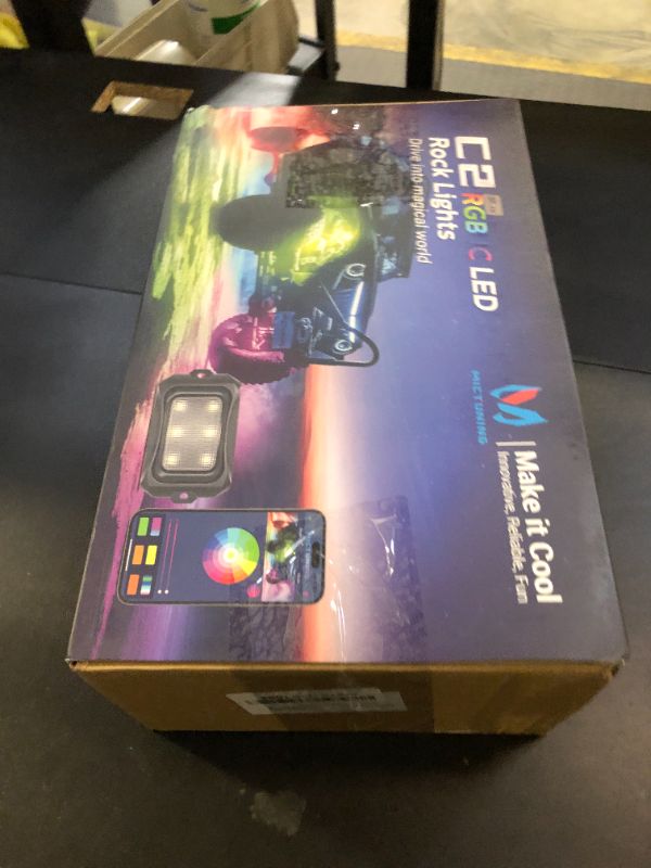 Photo 1 of MICTUNING C2 Max RGB+IC Chasing Color LED Rock Lights - 12 Pods Underglow Lighting Kit, Dynamic Lighting Modes, Extensible Up to 24 Pods with Stable APP Control, IP68 Waterproof, DIY Effect