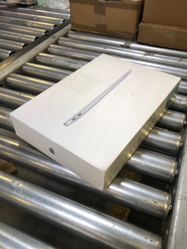 Photo 1 of 2020 Apple MacBook Air Laptop: Apple M1 Chip, 13” Retina Display, 8GB RAM, 256GB SSD Storage, Backlit Keyboard, FaceTime HD Camera, Touch ID. Works with iPhone/iPad; Silver