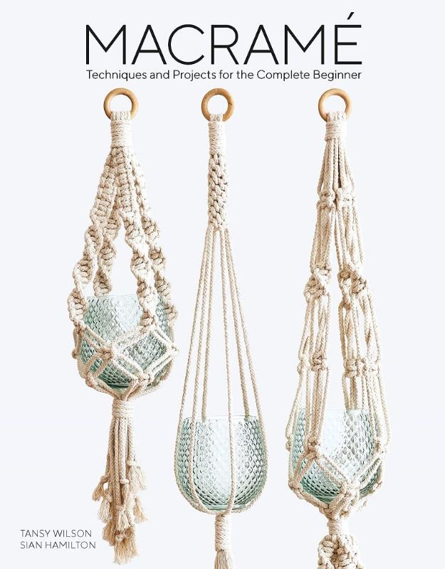Photo 1 of Macrame: 11 projects to make including dreamcatchers, wall hangings, plant holders and clutch bag Paperback – February 25, 2020