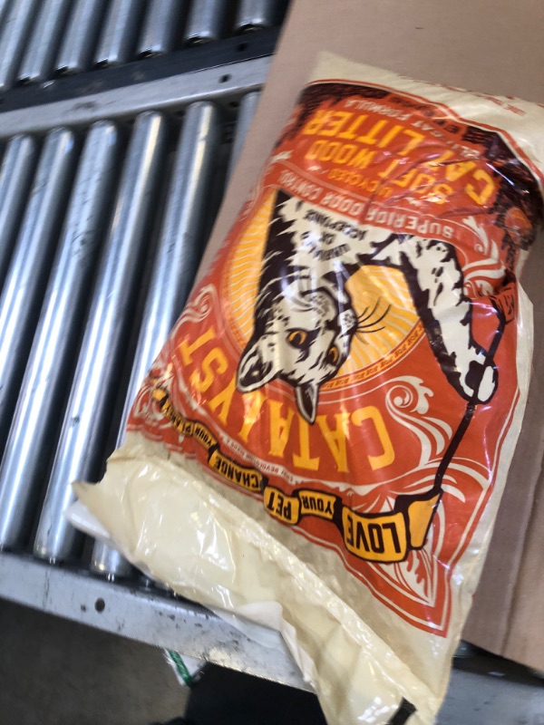Photo 1 of soft wood kitty litter 