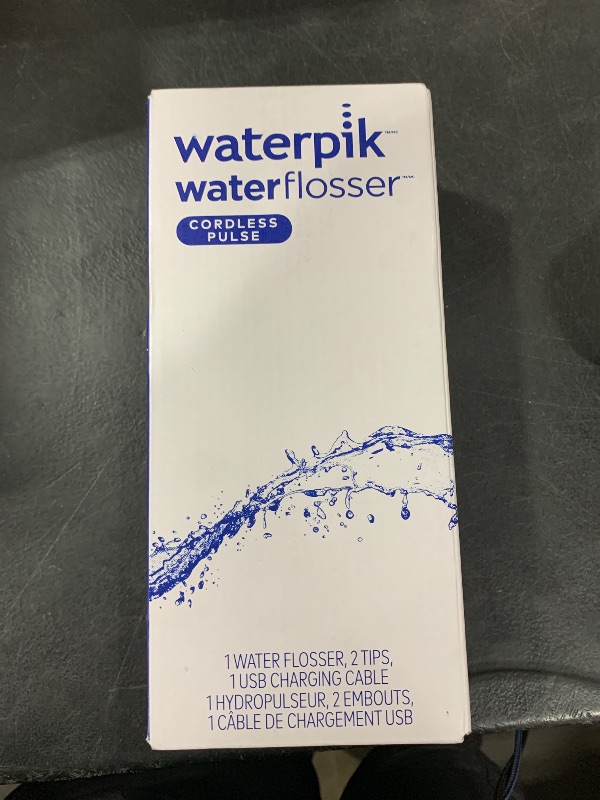 Photo 1 of Waterpik Cordless Pulse Rechargeable Portable Water Flosser for Teeth, Gums, Braces Care and Travel with 2 Flossing Tips, Waterproof, ADA Accepted, WF-20 Blue, Packaging May Vary