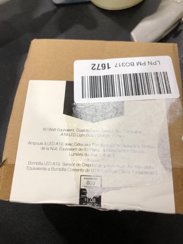 Photo 1 of Amazon Basics A19 Dusk to Dawn Sensor LED Outdoor Light Bulb, 60W Equivalent, Energy-Efficient 9W, Daylight White, 2700K, E26 Base, 10,000 Hours, 2 Count (Pack of 1)