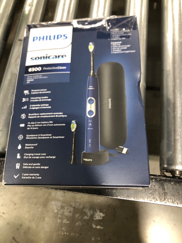 Photo 1 of Philips Sonicare ProtectiveClean 6500 Rechargeable Electric Toothbrush, with Pressure Sensor, 3 Cleaning Modes, SmarTimer and QuadPacer, 14-Day Battery Life, Charging Travel Case, Navy Blue, HX6462/07