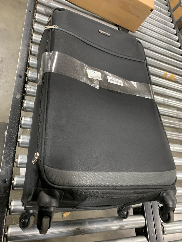 Photo 1 of Amazon Basics Luggage, 30" Large Checked Softside Suitcase With Wheels, With Four 360-Degree Multi-directional Spinner Wheels, Expandable Space, Zippered Pocket and Straps, Telescopic Handle, Black