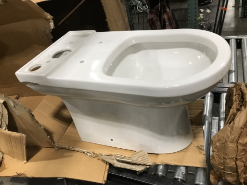 Photo 4 of Signature Hardware 447387 Milazzo 1.28 GPF Two Piece Elongated Skirted Chair Height Toilet - Seat Included - White