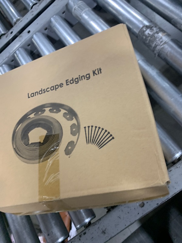 Photo 1 of 2in x 33FT Landscape Edging Border with 50 Spikes, No Dig Garden Edging Border Lawn Edging, Plastic Edging for Landscaping Flower Beds Yard Pathway Paver Edging (Black)