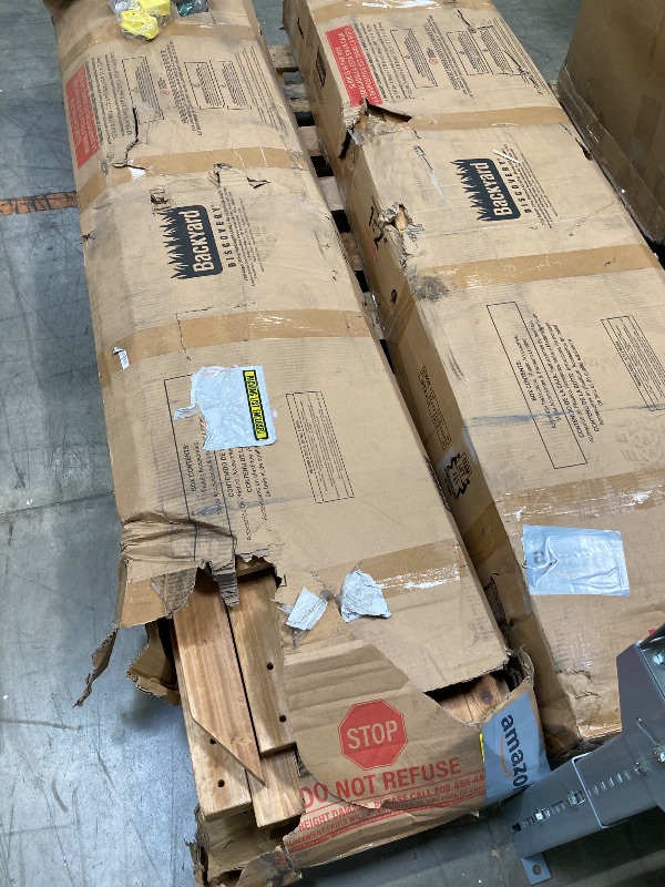 Photo 1 of ***BOX 1 OF 2  & BOX 2 OF 2 SOLD AS SET***
 Backyard Discovery Mount McKinley All Cedar Wood Swing Set  ***SOME WOOD CHIPS ALONG EDGE, BOX RIPPED/TORN)***