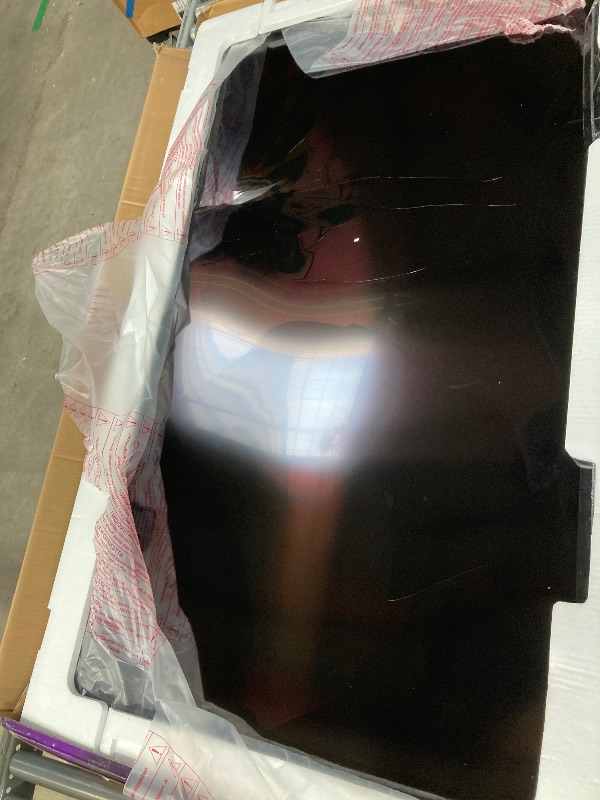 Photo 1 of **PARTS ONLY/CRACKED SCREEN**Roku Smart TV – 65-Inch Plus Series 4K QLED RokuTV with Roku Voice Remote Pro, Dolby Vision, Striking 4K Resolution, Automatic Brightness, & Seamless Streaming – Live Local News & Sports