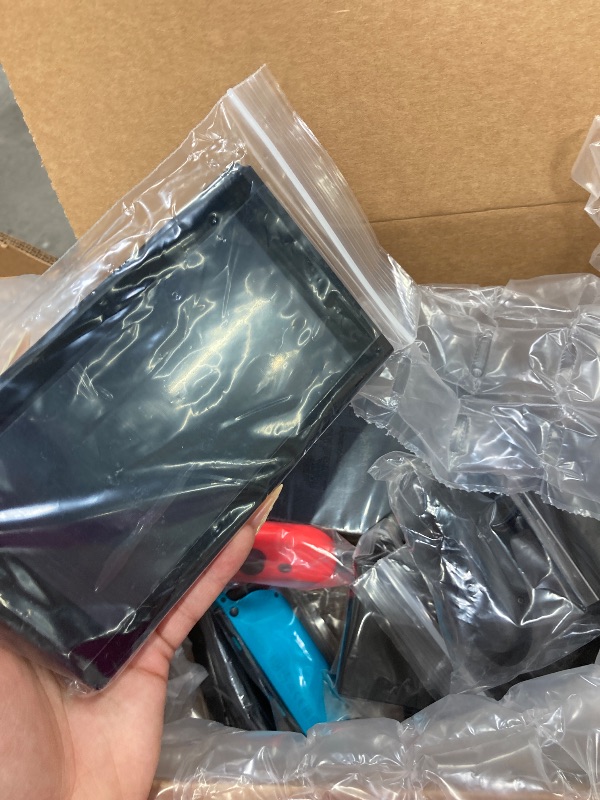Photo 1 of **PARTS ONLY/POSSIBLE DEFECTIVE BATTERY**(Refurbished) Nintendo Switch™ with Neon Blue and Neon Red Joy?Con™