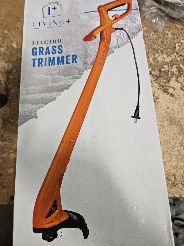 Photo 1 of Living + Electric Grass Cutter Corded with 6M Line, String Trimmer, Electric Weed Wacker, Brush Cutter, Bush Trimmer, 250W, Lightweight, and Efficient