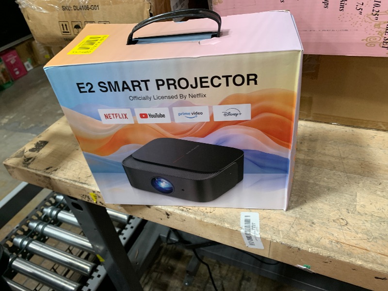 Photo 1 of [2025 Netflix-Official | 386+ Built-in Apps] DBPOWER E2 Smart Projector with WiFi and Bluetooth, Mini Projector 4K Support with Netflix, Youtube, Disney+, Hulu, Max, Crunchyroll w Portable Case