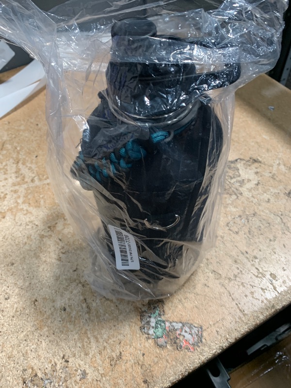 Photo 1 of (SEE NOTES) RAYMYLO Insulated Water Bottle 64 oz, Triple Wall Vacuum Stainless Steel (Cold for 48 Hrs), Leak Proof & Non-BPA, Half Gallon Water Flask Jug with Paracord Handle & Straw Spout Lids