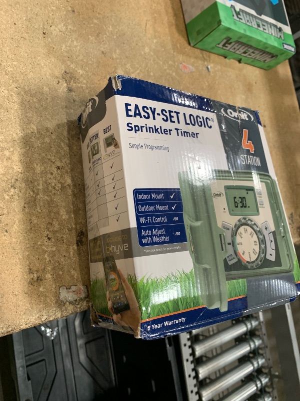 Photo 1 of (Used) Orbit 57894 4-Station Outdoor Swing Panel Sprinkler System Timer