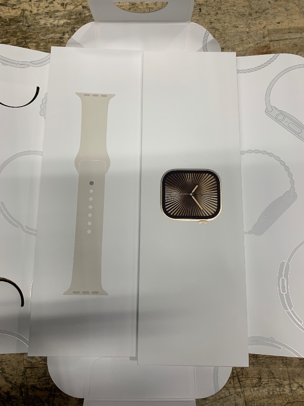 Photo 1 of **FACTORY SEALED**Apple Watch Series 10 [GPS + Cellular 42mm case] Smartwatch with Gold Titanium Case with Starlight Sport Band - S/M. Fitness Tracker, ECG App, Always-On Retina Display, Water Resistant MANUFACTURERER 