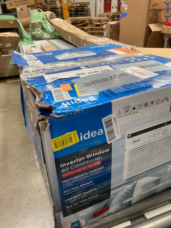 Photo 1 of Midea 12,000 BTU Smart Inverter Air Conditioner Window Unit with Heat and Dehumidifier – Cools up to 550 Sq. Ft., Energy Star Rated, Quiet Operation, Electronic Controls, Remote Control, White