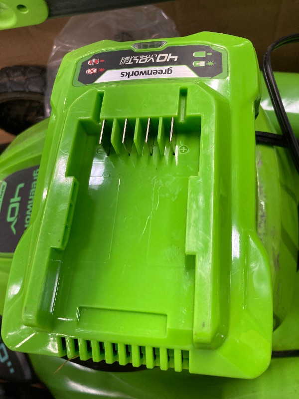 Photo 1 of **SELLING AS PARTS ONLY***DAMAGED HANDLE/MISSING CHARGER***USED GRASS RESIDUE, SOME SCUFFS/SCRATCHES***

Greenworks 40V 17”? Brushless (Push) Cordless Lawn Mower, 4.0Ah Battery and Charger