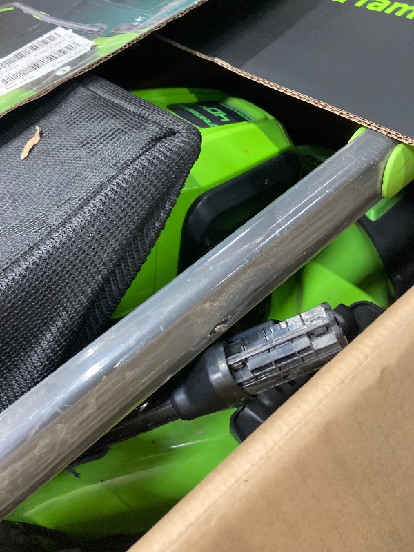 Photo 1 of **SELLING AS PARTS ONLY***DAMAGED HANDLE/MISSING CHARGER***USED GRASS RESIDUE, SOME SCUFFS/SCRATCHES***

Greenworks 40V 17”? Brushless (Push) Cordless Lawn Mower, 4.0Ah Battery and Charger