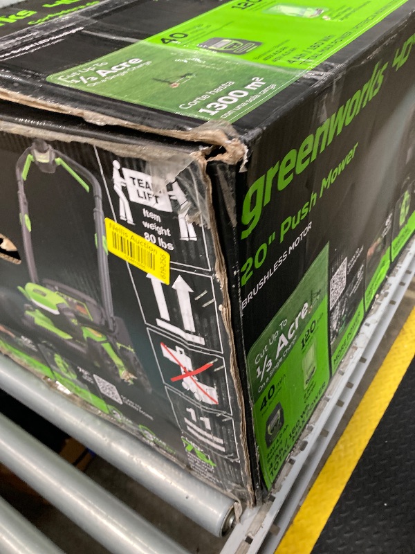 Photo 1 of **SELLING AS PARTS ONLY***DAMAGED HANDLE/MISSING CHARGER***USED GRASS RESIDUE, SOME SCUFFS/SCRATCHES***

Greenworks 40V 17”? Brushless (Push) Cordless Lawn Mower, 4.0Ah Battery and Charger