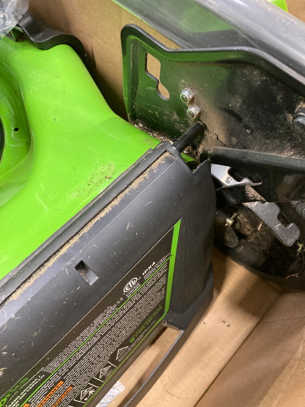 Photo 1 of **SELLING AS PARTS ONLY***DAMAGED HANDLE/MISSING CHARGER***USED GRASS RESIDUE, SOME SCUFFS/SCRATCHES***

Greenworks 40V 17”? Brushless (Push) Cordless Lawn Mower, 4.0Ah Battery and Charger