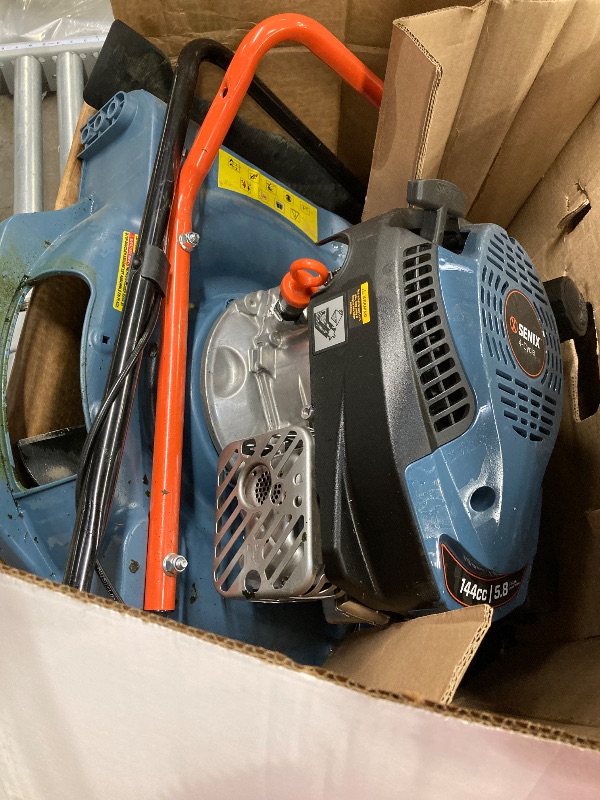 Photo 1 of **Broken missing wheel** SENIX Gas Lawn mower, 18in Cutting Blade / 19in Cutting Deck, 144cc 4-Cycle Engine Push Mower with Side Discharge