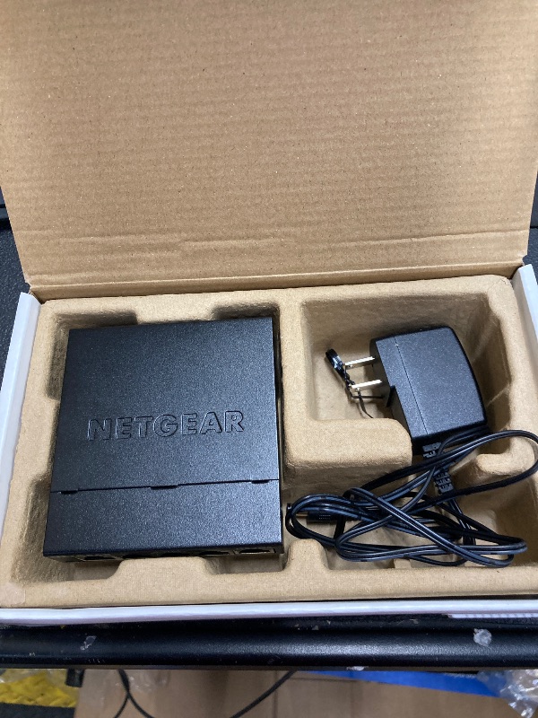 Photo 1 of NETGEAR 5-Port Gigabit Ethernet Unmanaged Essentials Switch (GS305) - Home Network Hub, Office Ethernet Splitter, Plug-and-Play, Silent Operation, Desktop or Wall Mount