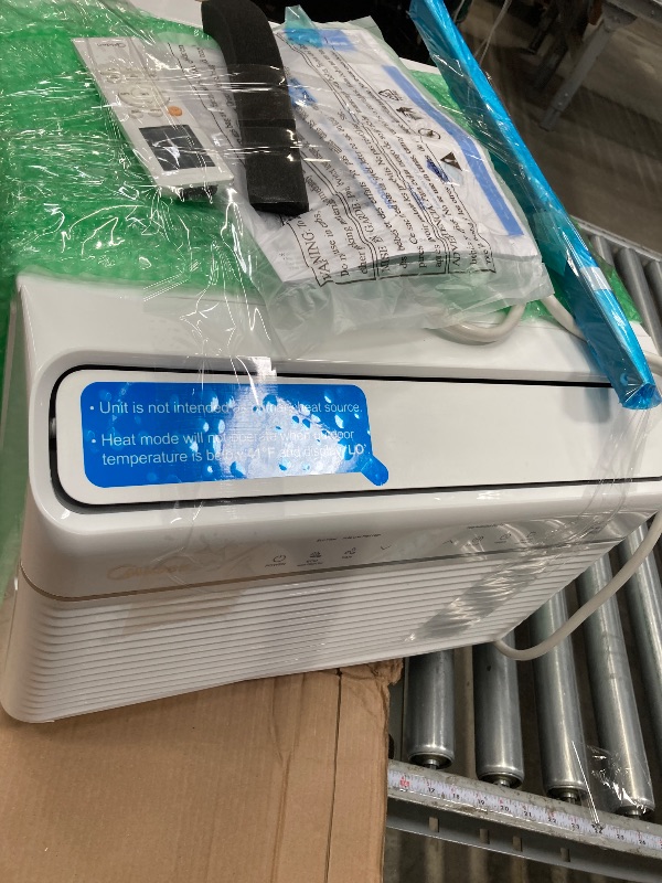 Photo 1 of Midea 8,000 BTU Smart Inverter Air Conditioner Window Unit with Heat and Dehumidifier – Cools up to 350 Sq. Ft., Energy Star Rated, Quiet Operation, Electronic Controls, Remote Control, White