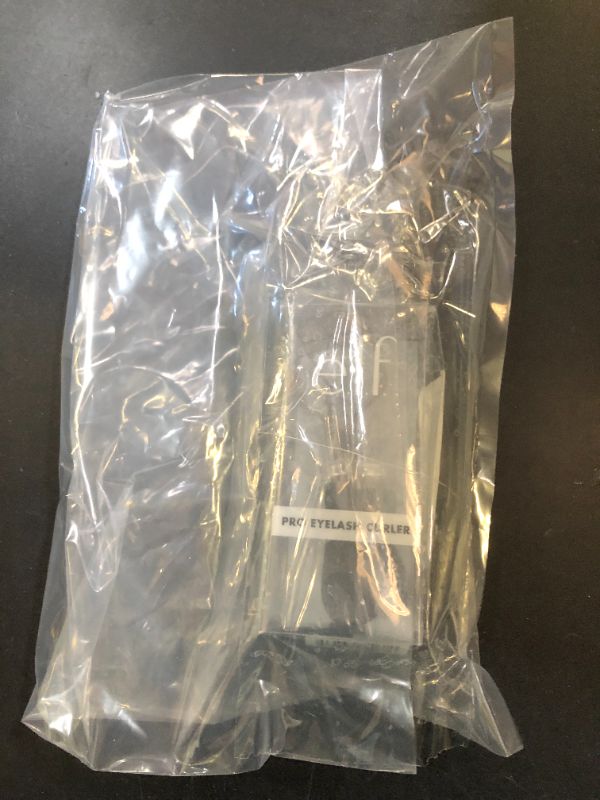 Photo 1 of e.l.f. Pro Eyelash Curler, Strong, Contoured, Eye-Opening, Voluminous Lashes, Includes Additional Rubber Replacement Pad, Silver