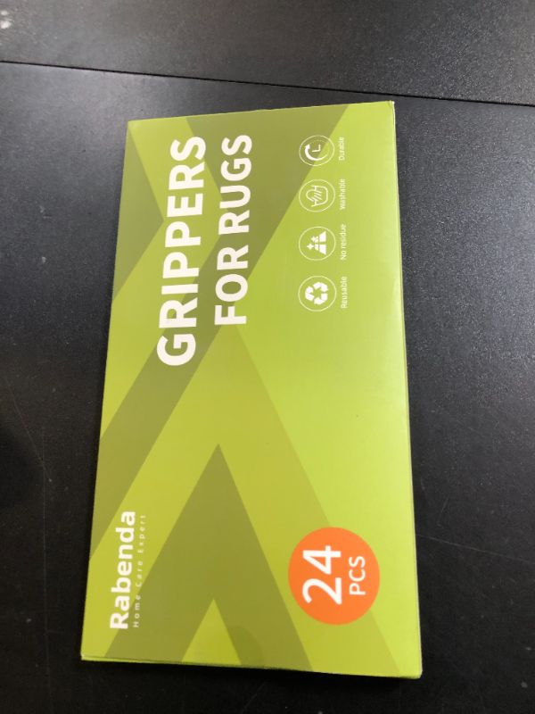 Photo 1 of Rabenda 24 Pcs Grippers for Rugs, Non Slip Rug Pads for Hardwood Floors and Tiles, Reusable Rug Tape for Area Rugs, Dual Sided Adhesive Rug Pad Gripper Keep Corners Flat(Black)