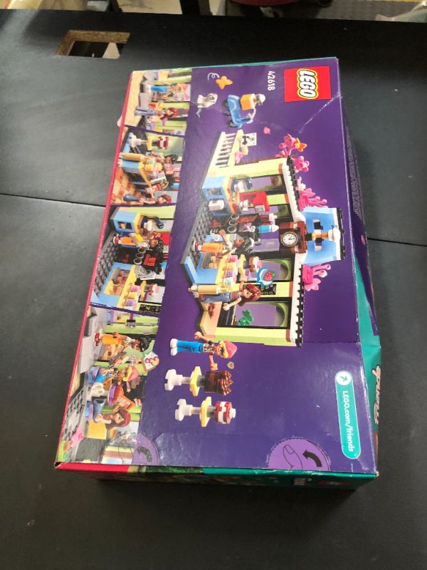 Photo 1 of LEGO Friends Heartlake City Café Shop Toy for Kids, Bakery Building Set, Birthday Gift Idea for Girls and Boys Ages 6 Years and Up with 3 Mini Dolls and a Dog Toy Figure, 42618