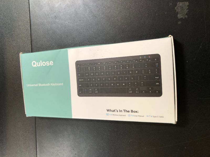 Photo 1 of Qulose Bluetooth Keyboard, Ultra-Slim Wireless Keyboard for iPad, Rechargeable Ergonomic Computer Keyboard for iOS, Android, Windows PC Tablets Phone, White Silver