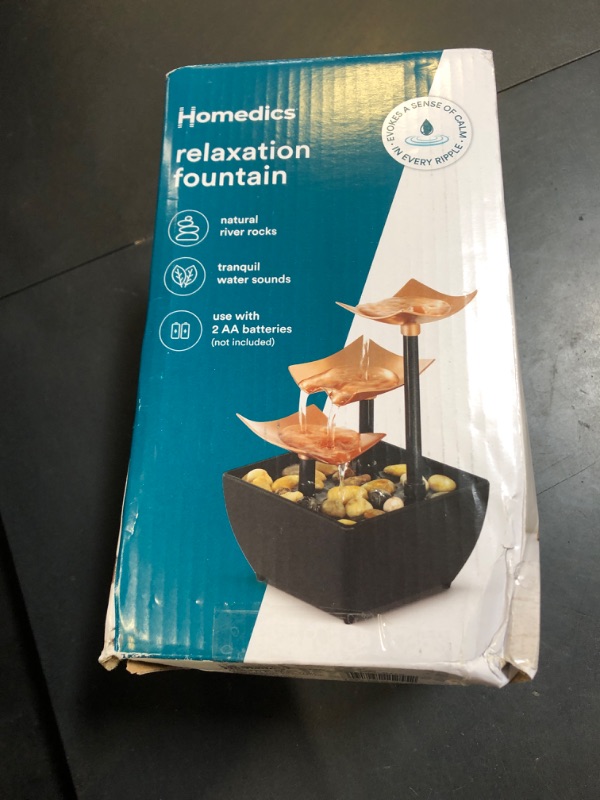 Photo 1 of Homedics Golden Dew Relaxation Tabletop Water Fountain with 3 Tiers, Natural River Rocks, and a Quiet Pump for Soothing Zen Ambiance in Your Home or for Office Décor, Powered by 2 AA Batteries