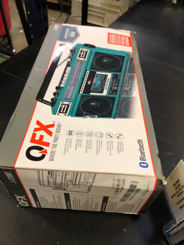 Photo 1 of QFX J-220BTTQ Aqua Turquoise Boombox MP3 Conversion from Radio to Cassette with 4-Band (AM, FM, SW1, SW2) Radio with Bluetooth, Dual 3” Speakers, Built-in Microphone, Recorder, and a 3-Band Equalizer