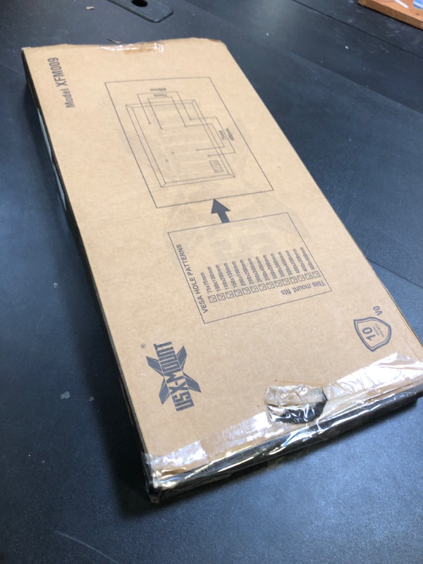 Photo 1 of USX MOUNT Fixed TV Wall Mount with Low Profile for Most 26-60 Inch LED, LCD and Flat Screen TVs, Wall Mount Bracket with VESA Up to 400x400mm and Weight Capacity 99lbs,and Space Saving TV Bracket