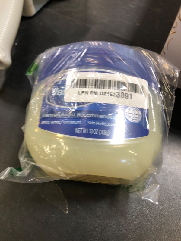 Photo 1 of Vaseline Healing Jelly Original White Petroleum Jelly Protectant For Dry Cracked Skin and Eczema Relief Pure Petroleum Jelly 13 oz
