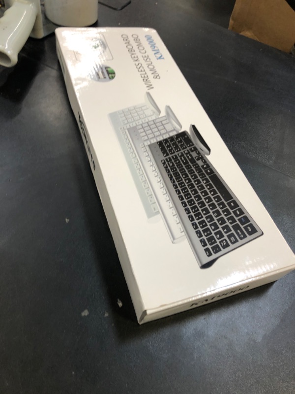 Photo 1 of Wireless Keyboard and Mouse Ultra Slim Combo, TopMate 2.4G Silent Compact USB 2400DPI Mouse and Scissor Switch Keyboard Set with Cover, 2 AA and 2 AAA Batteries, for PC/Laptop/Windows/Mac - White