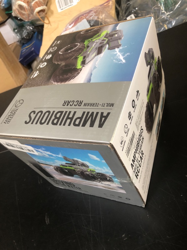 Photo 1 of Amphibious Remote Control Car Boat Water Squirt RC Tank 2.4GHz Gesture Sensor 4WD Monster Truck RC Cars 360°Rotating Waterproof Stunt Car for Age 6 7 8 9-12 Kids Girls Boys Gift Beach Pool Water Toy