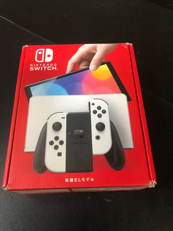 Photo 1 of Nintendo Switch (OLED model) with White Joy-Con