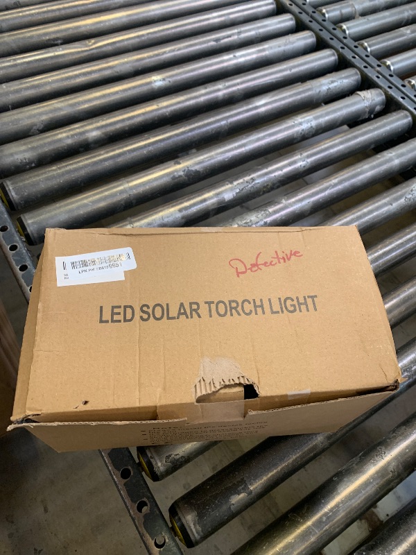 Photo 1 of iBaycon 2 Pack 28" Solar Flame Torch Lights, Flickering Flame Garden Lights Outdoor Waterproof, Solar Pathway Light for Yard Lawn Path Landscape Decor