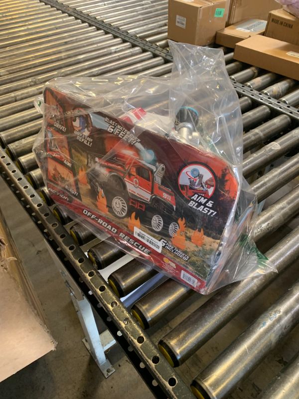 Photo 1 of Sunny Days Entertainment Maxx Action Fire Rescue Off Road Over 14" Firetruck Toy with Working Water Cannon and Targets, Lights, Sounds, Motorized Drive and Shooting Water, Extra Large