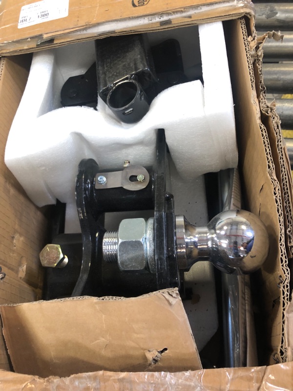 Photo 1 of CURT 17063 Round Bar Weight Distribution Hitch with Integrated Lubrication and Sway Control, Up to 14K, 2-In Shank, 2-5/16-Inch Ball , Black