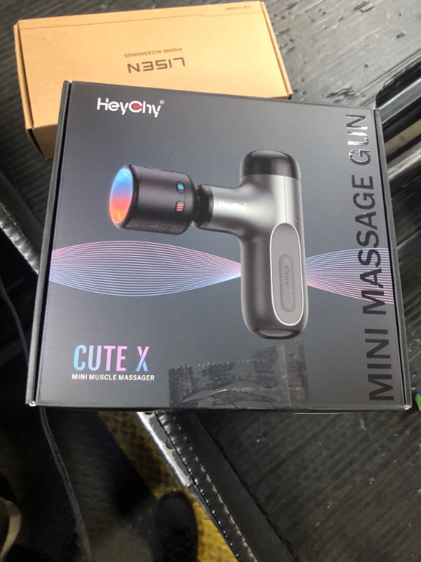 Photo 1 of HEYCHY Mini Massage Gun with Heat and Cold, Deep Tissue Massage Gun, Portable Percussion Muscle Massager with 4 Massage Heads for Athletes
