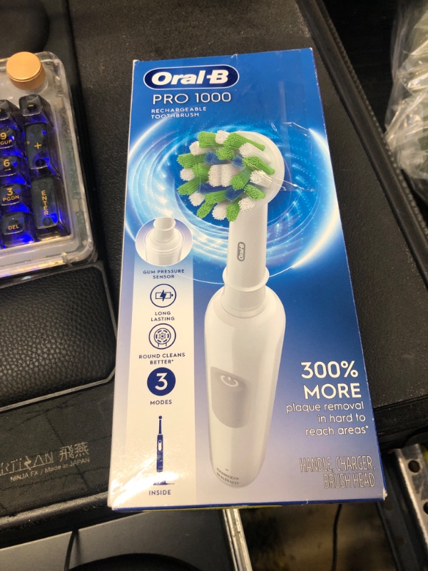 Photo 1 of Oral-B Pro 1000 Rechargeable Electric Toothbrush, White