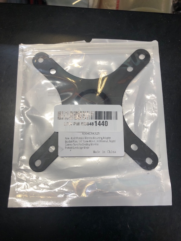 Photo 1 of Kado Portable Monitor Mounting Adapter Bracket Plate, 1/4" Screw Hole to 100x100mm 75x75mm, M4 Screw Set Wall Mount Arm Mount Universal, Tripod Camera Stand for Desktop Monitor Portrait/Landscape Mode