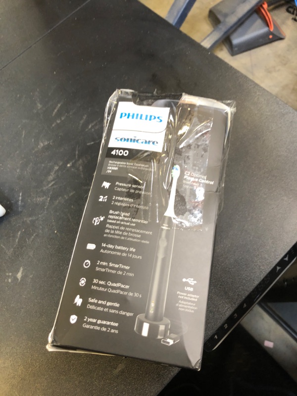 Photo 1 of Philips Sonicare 4100 Rechargeable Electric Toothbrush, with Pressure Sensor, 2 Intensity Settings, SmarTimer and QuadPacer, 14-Day Battery Life, Black, Model HX3681/24