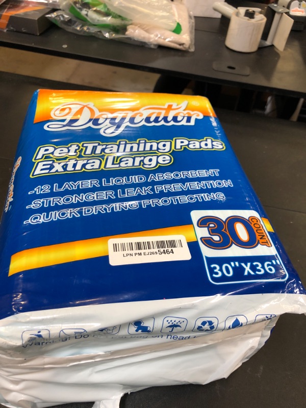 Photo 1 of Dogcator Dog Pee Pads Extra Large 30"x36", 30 Count Super Absorbent Pee Pads for Dogs, Disposable Urine Bed Pads for Doggie, Thicken XXL Puppy Pads, Piddle Pads X-Large for Indoor, Outdoor Use