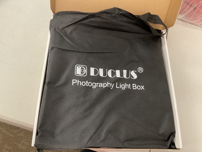 Photo 1 of DUCLUS Light Box Photography, 12"x12" Professional Photo Booth Box with 8 Photo Backdrop, 120 LED Lights Dimmable & high CRI>95 Lightbox for Mini Product Photography: Jewelry, Miniature Models etc.