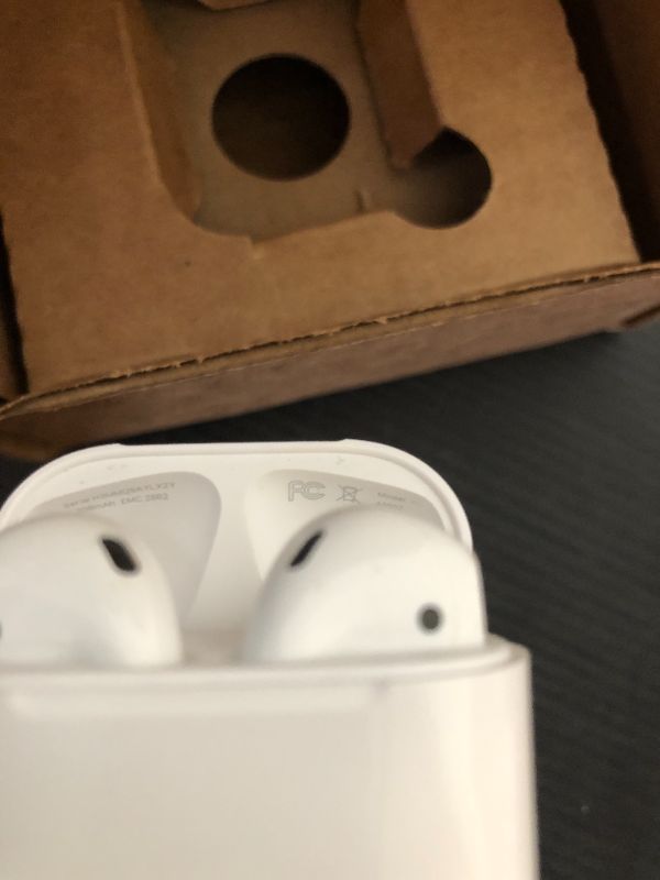 Photo 1 of Apple AirPods Wireless Ear Buds, Bluetooth Headphones with Lightning Charging Case Included, Over 24 Hours of Battery Life, Effortless Setup for iPhone