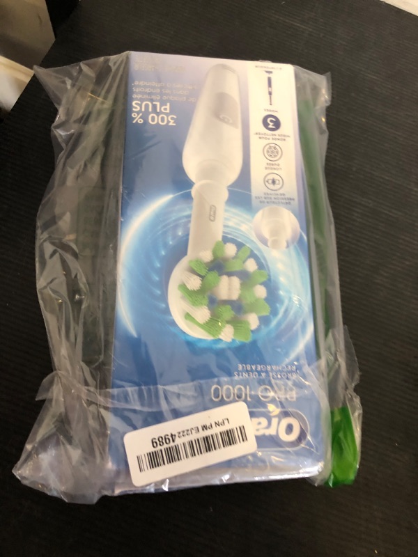 Photo 1 of Oral-B Pro 1000 Rechargeable Electric Toothbrush, White