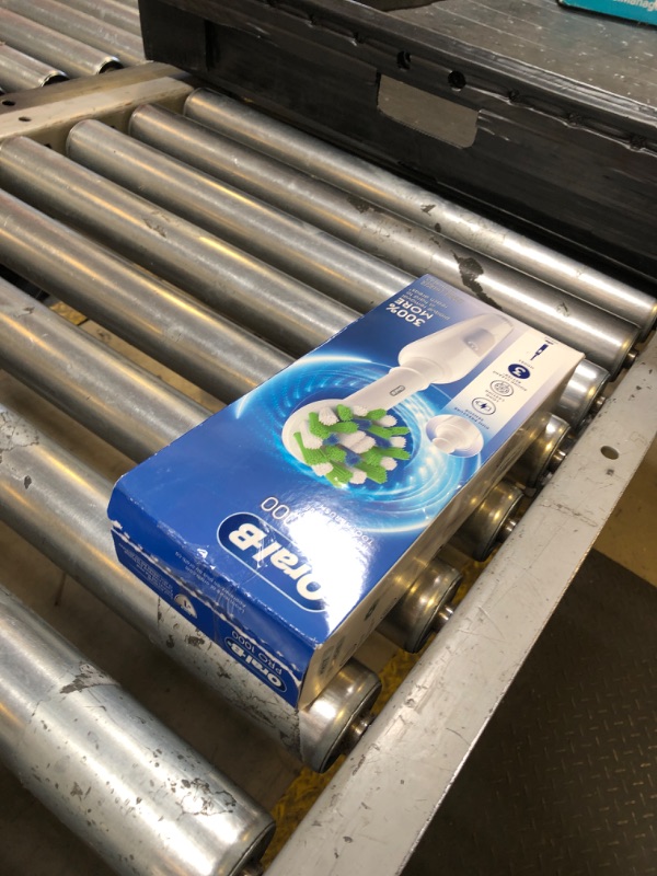 Photo 1 of Oral-B Pro 1000 Rechargeable Electric Toothbrush, White